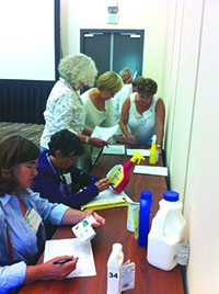 UC Master Gardeners learn to read pesticide labels in hands-on training.