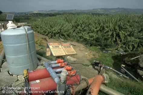 Chlorinating surface stream water for flower irrigation.