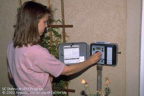 Programming an automatic timer of an irrigation system. When properly operated, an irrigation controller can help you avoid overwatering or underwatering plants.