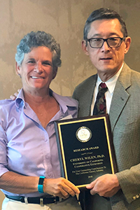 Cheryl Wilen (left) was presented an award for her many accomplishments over her career, shown here with UC Cooperative Extension Specialist Loren Oki (right). Credit: Jill Damskey, California Association of Nurseries and Garden Centers. Photo by: Jill Damskey, California Association of Nurseries and Garden Centers