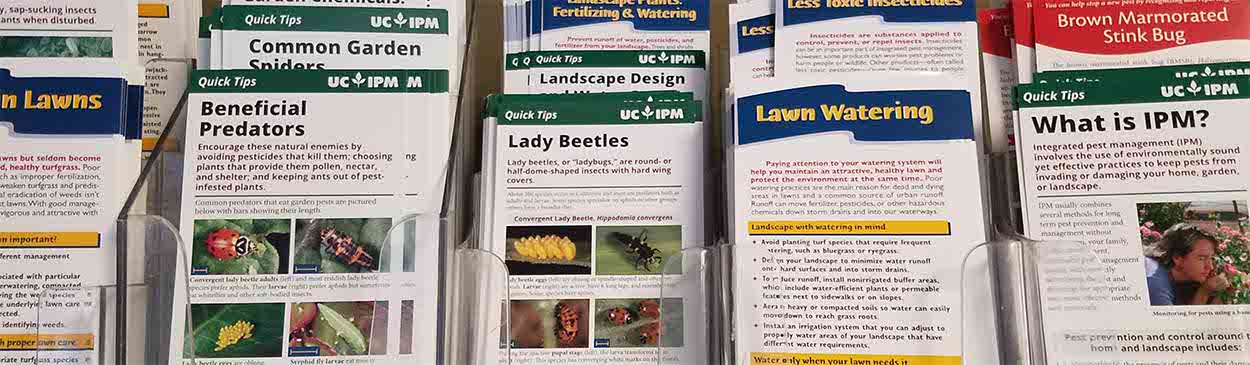 Rack of UCIPM Quick Tips, short pest management publications for home gardeners and residents.; Davis, CA